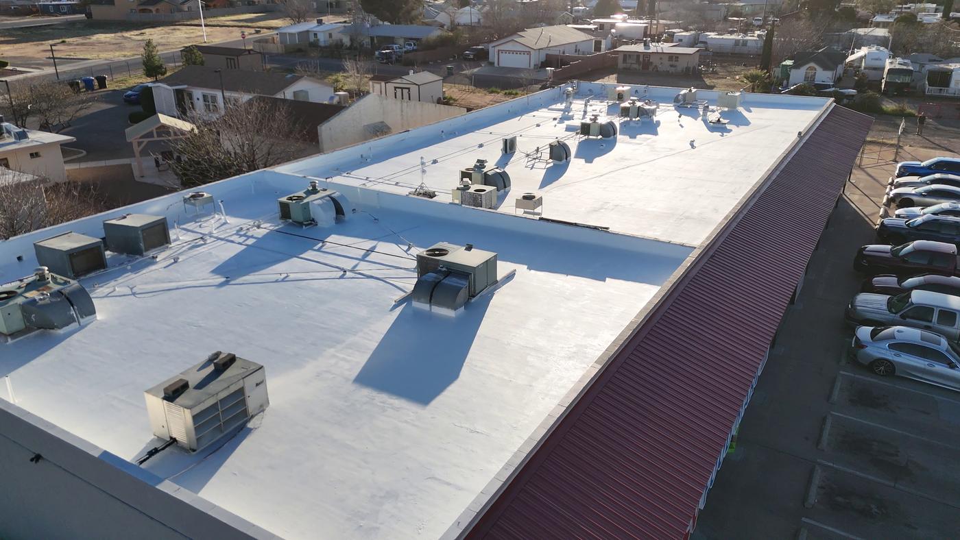 Finished roof coating on a commercial building.