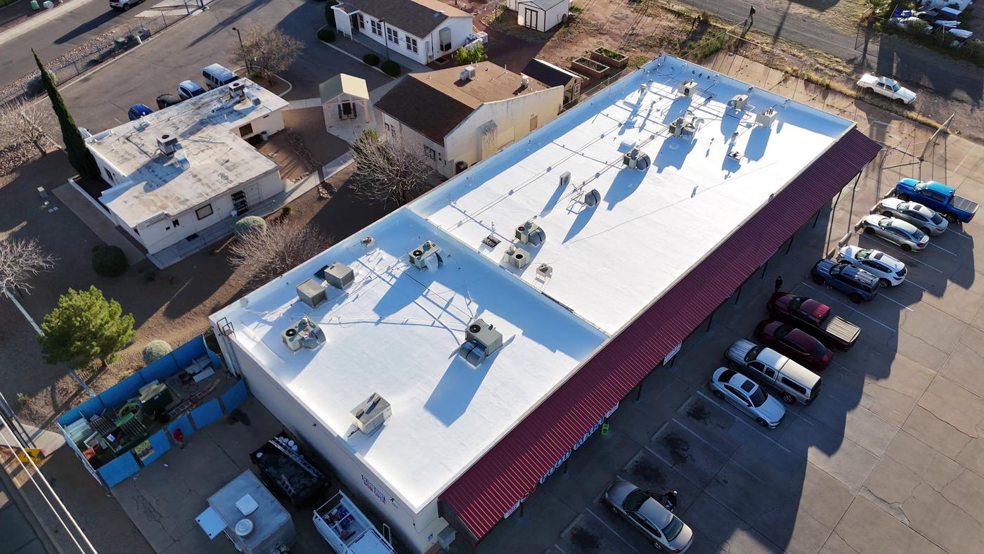 Finished roof coating on a commercial building.