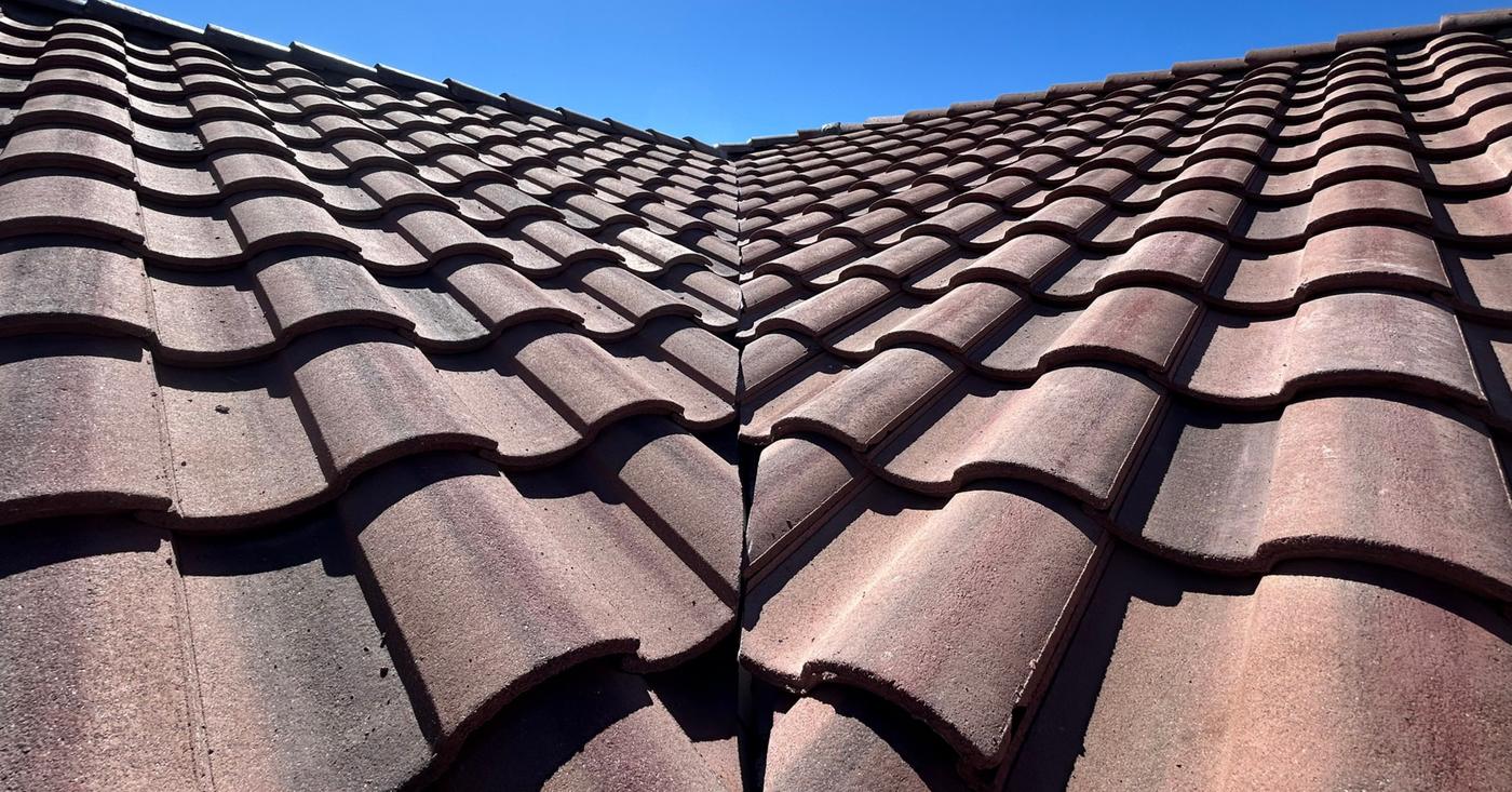 Valley repair on a concrete tile roof.