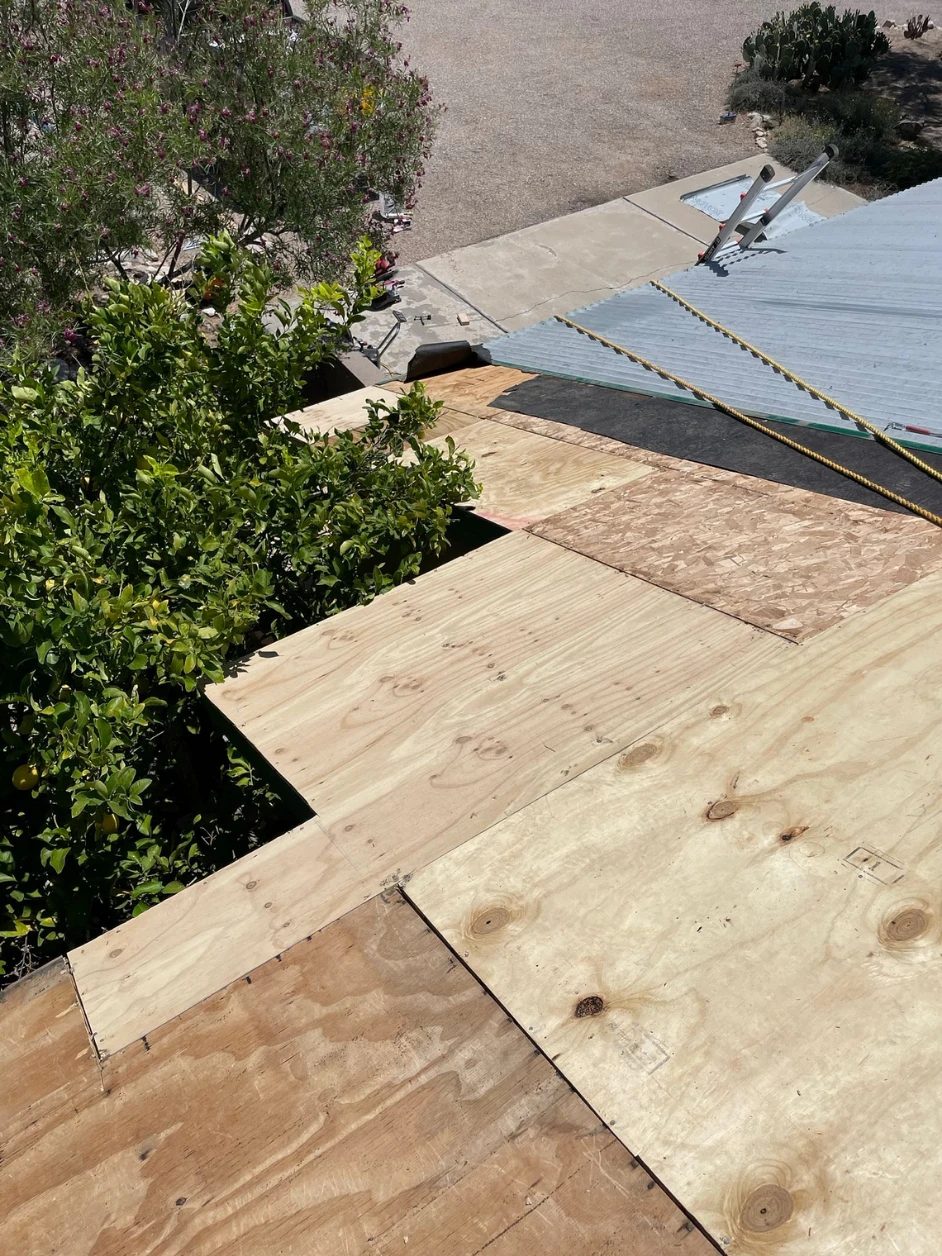 New plywood decking installed where the damaged roof deck was removed