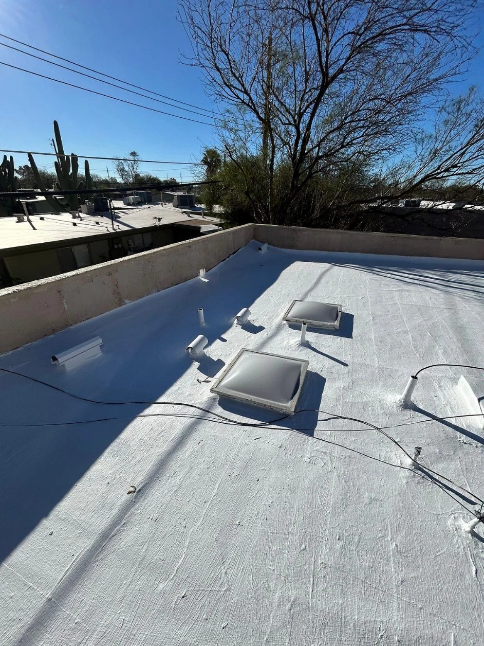The finished roof after coating, draining evenly