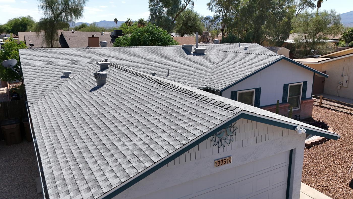 Finished roof with GAF Birchwood asphalt shingles.