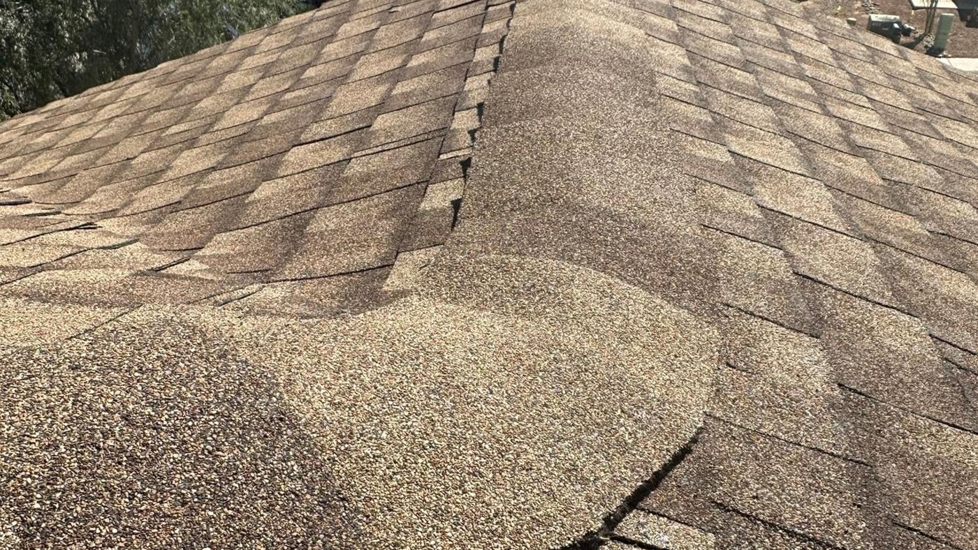 GAF shingle ridge cap detail at a roof ridge junction.