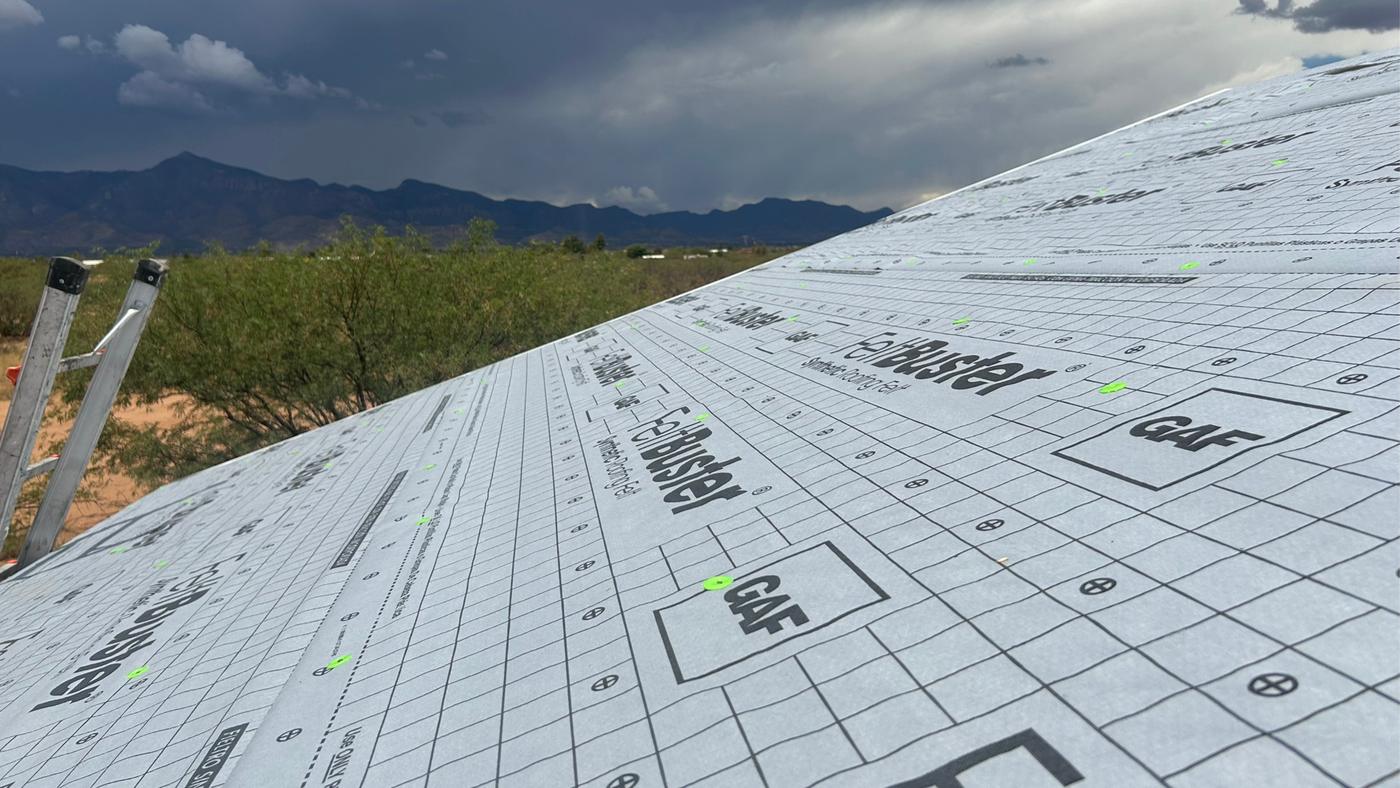 GAF FeltBuster synthetic underlayment installed across the roof deck.