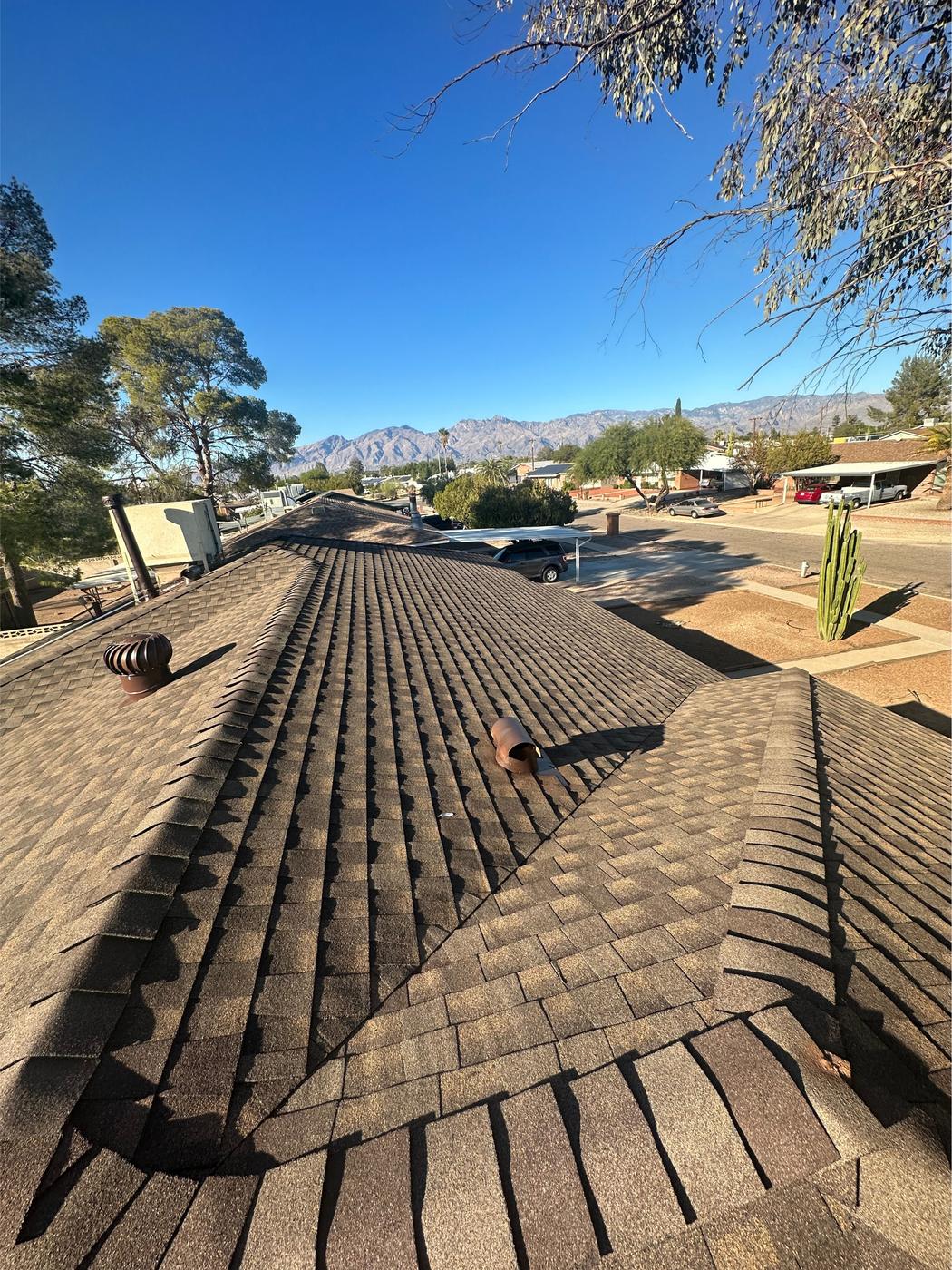 Finished roof with GAF Barkwood asphalt shingles.