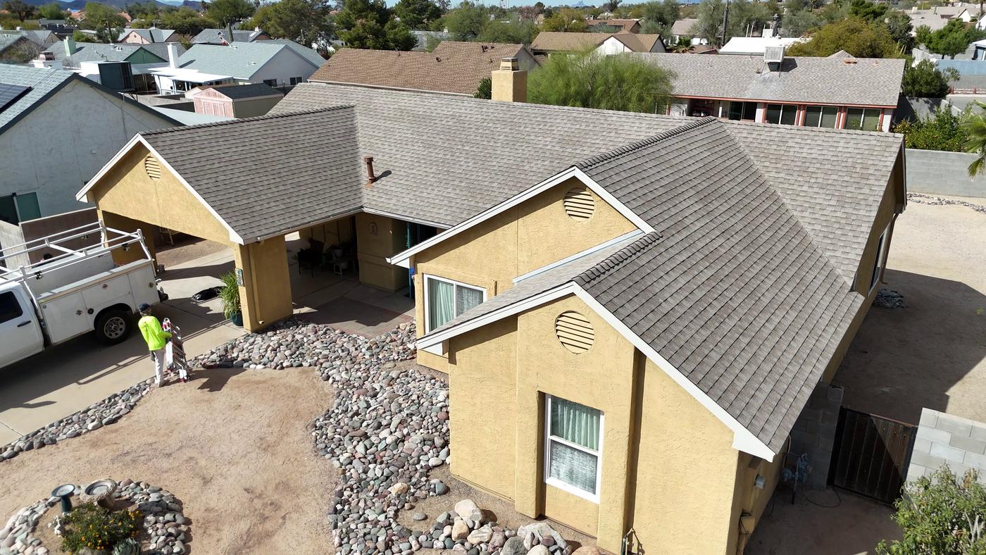 Aerial view of a finished asphalt shingle roof.