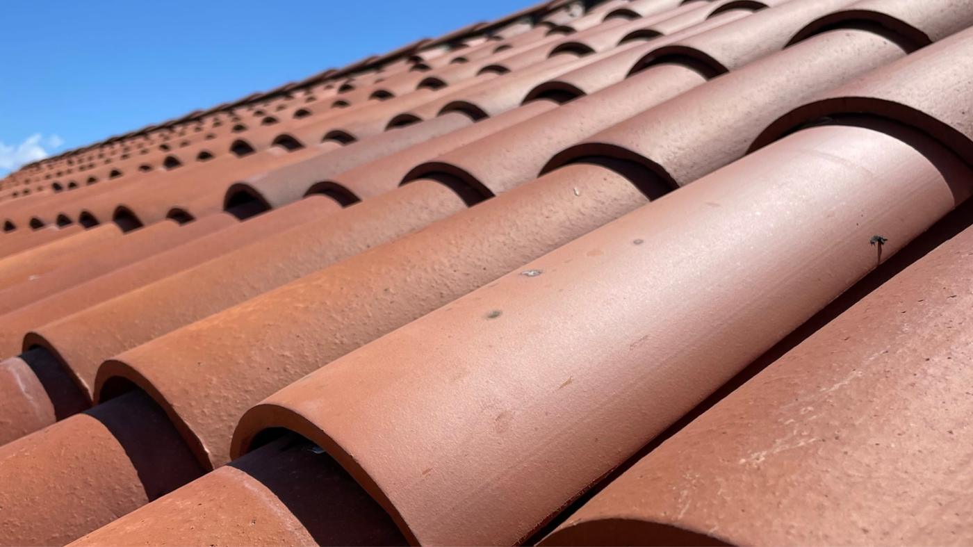 Finished two-piece clay tile roof.