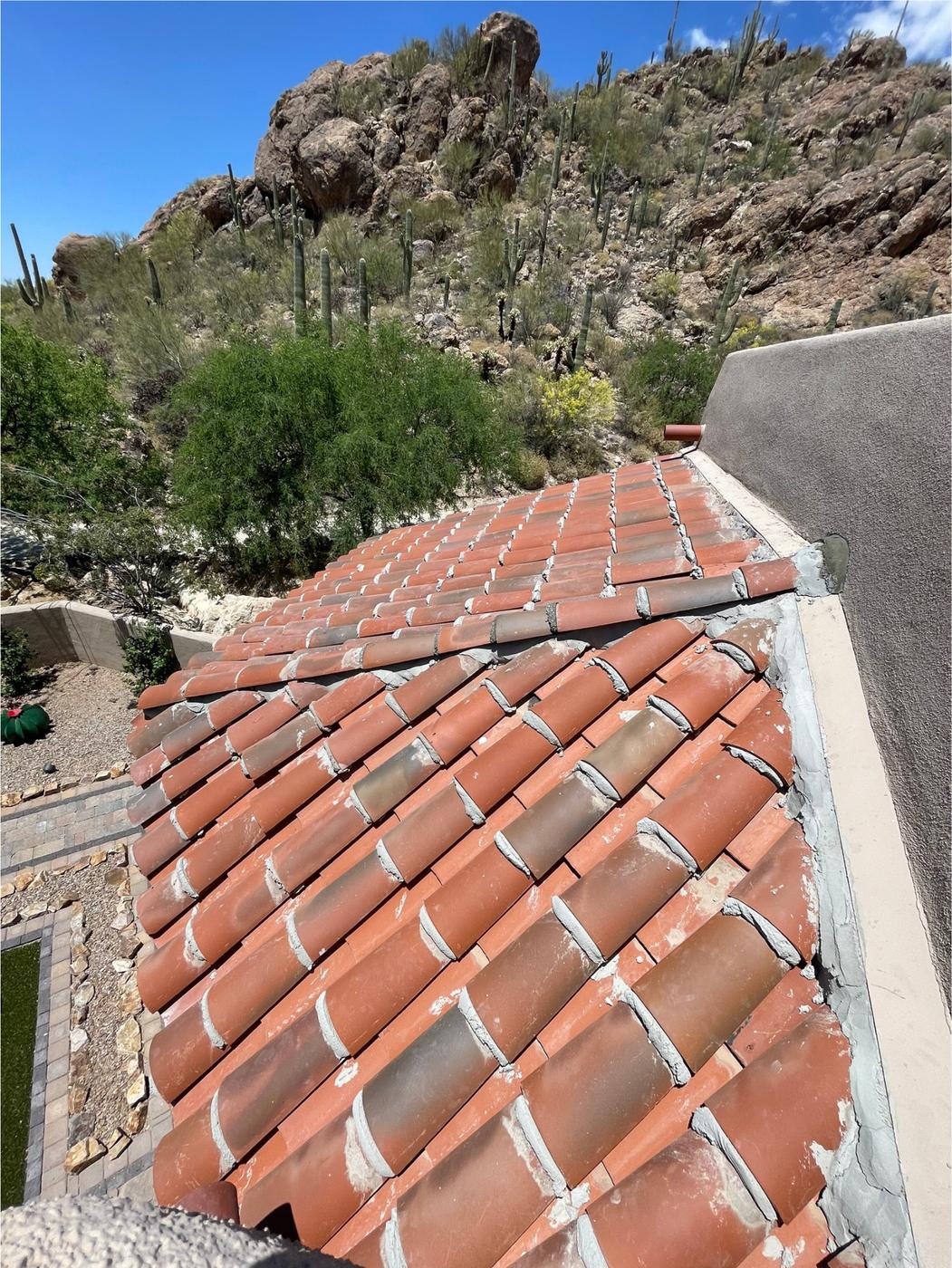 Two-piece clay tile roof.