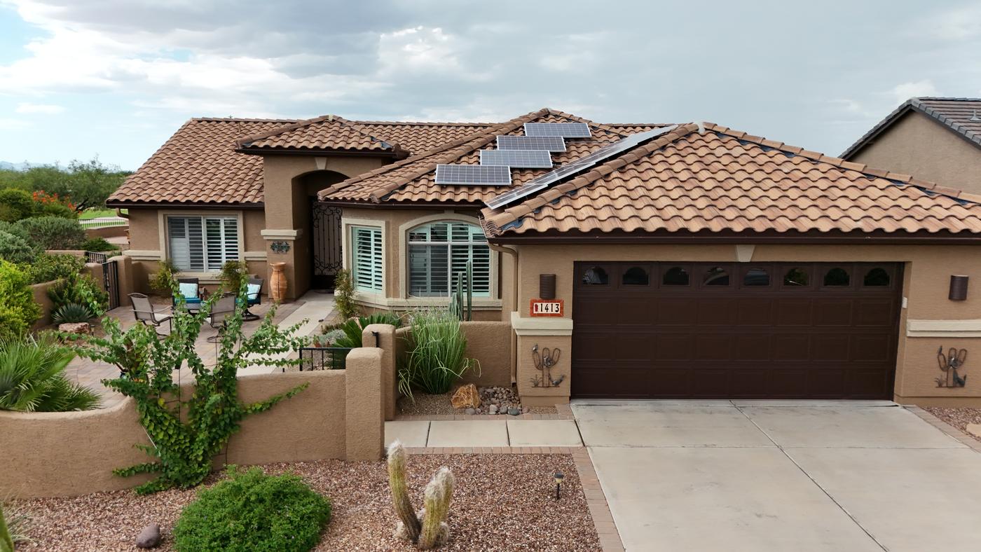 Finished tile roof with solar panels reinstalled.