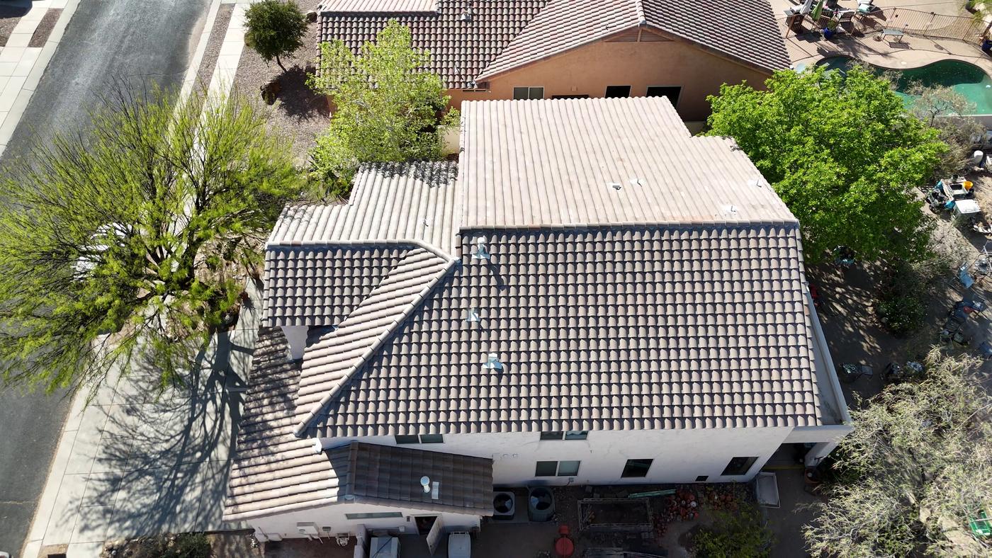 Aerial view of a finished S-type concrete tile roof on a two-story home.
