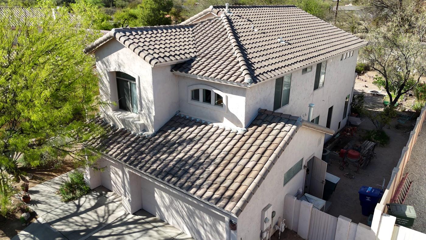 Aerial view of a finished S-type concrete tile roof on a two-story home.