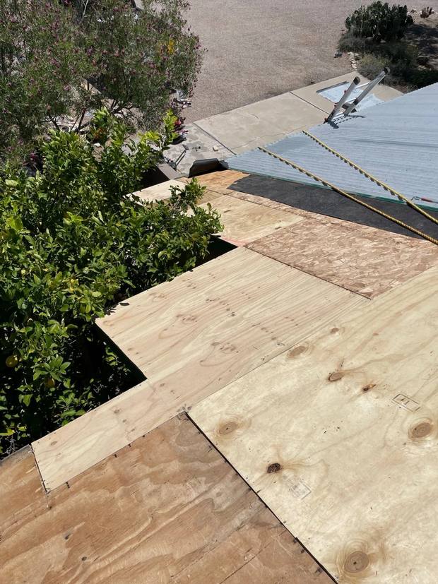 New plywood decking installed where the damaged roof deck was removed