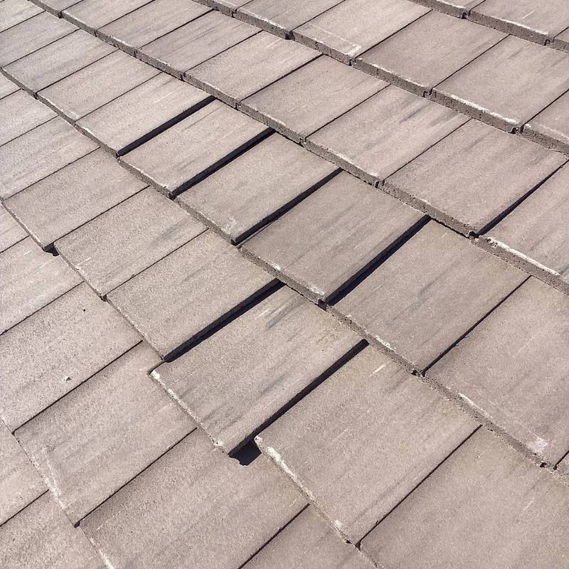 Concrete tiles slipped out of line on a Tucson roof