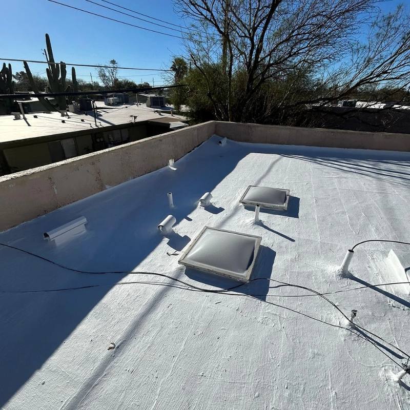 The finished roof after coating, draining evenly