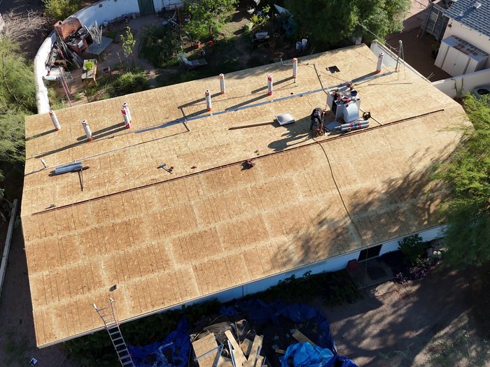 Roof deck sheathing exposed during a SolTerra roof replacement